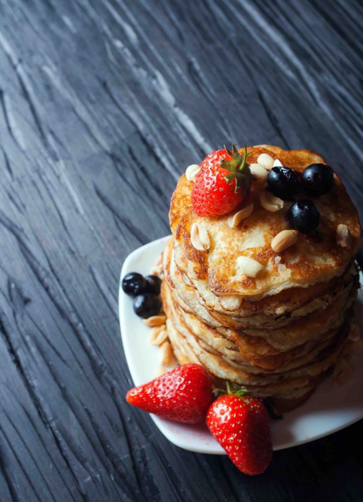 Delicious dessert with strawberries and blueberries